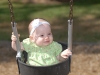 Lily swinging for the first time