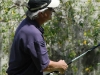 Bob Hayes drivng on hole 1 of the Island Course