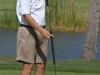 Tom Hayes lining up his putt on 18