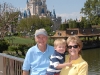 Grandma, Poppop and Hunter in front of castle