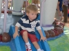 Hunter sliding at Toontown playground