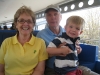 Grandma, Poppop and Hunter riding the people mover