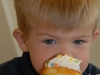 Hunter digs into his birthday cupcake